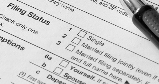 Close up of Form 1040, emphasis on filing status