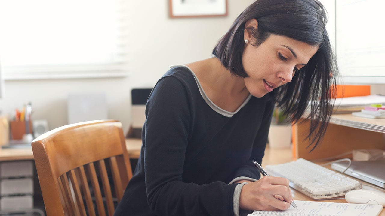 Woman making notes