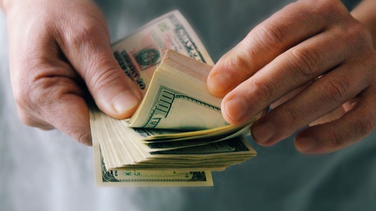 Man counting money