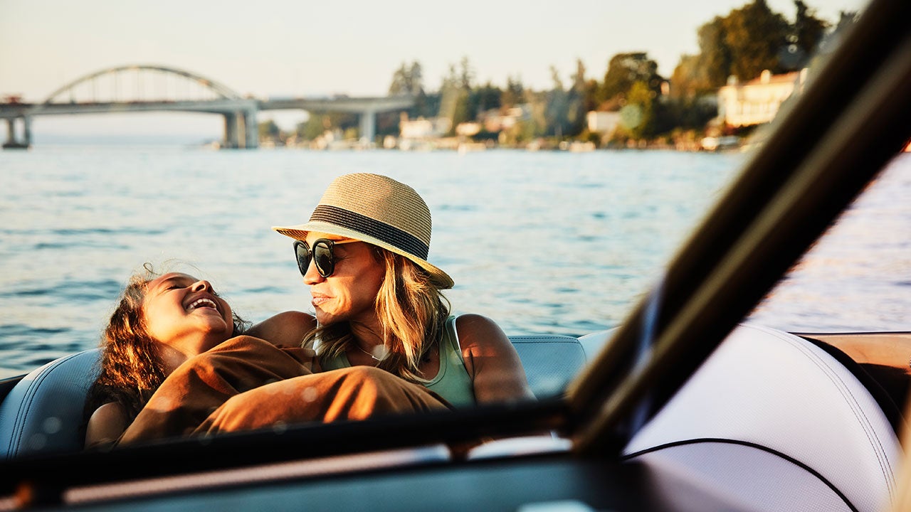 Mother and child on a boat in Summer