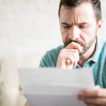 Man reading mail