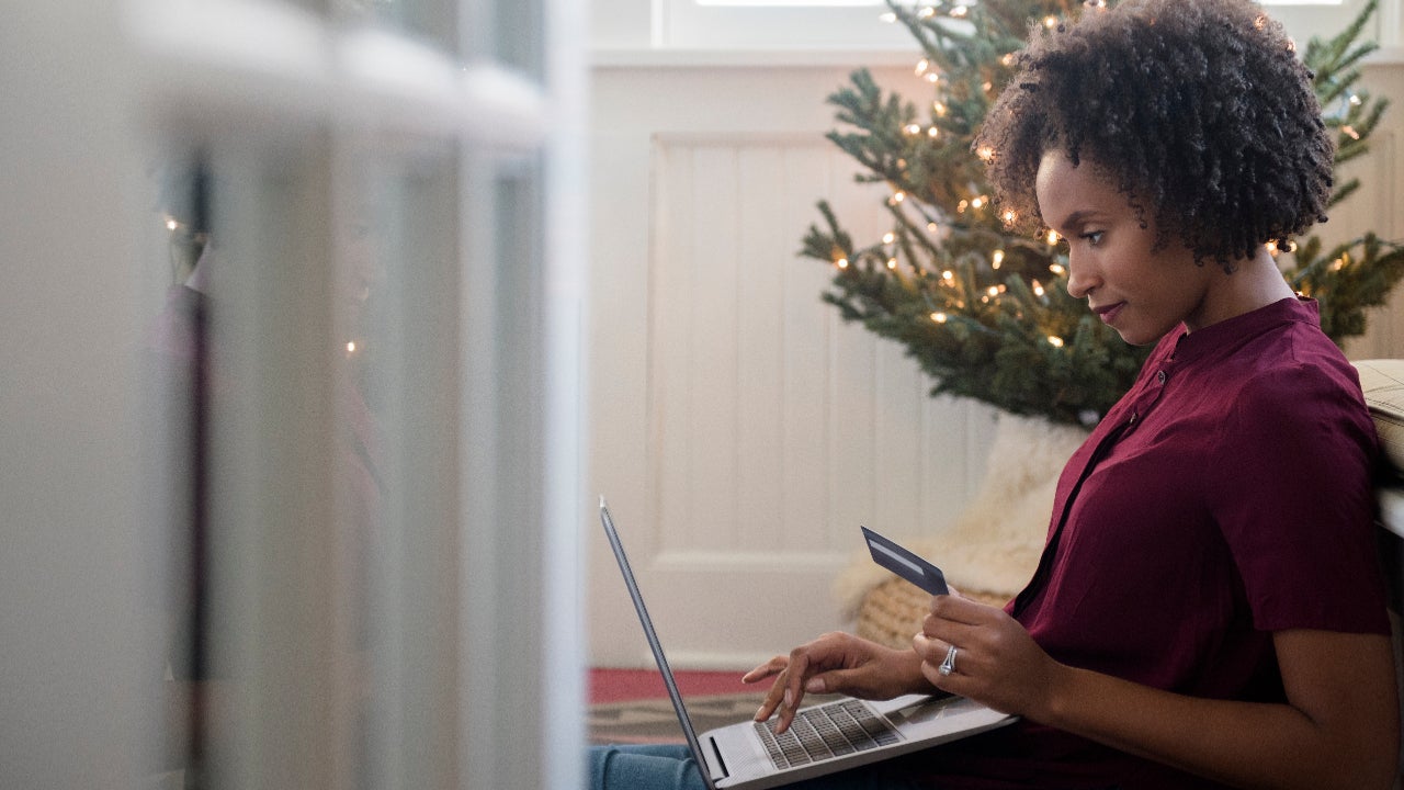 Person shopping on laptop