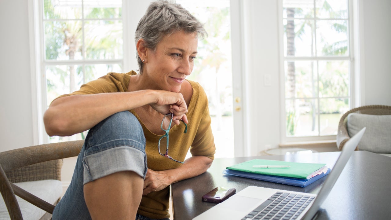 Person looking at their laptop