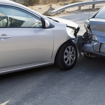 Two cars in collision on roadway