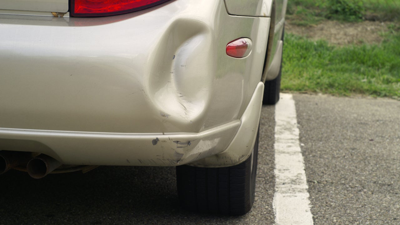 Dented car bumper