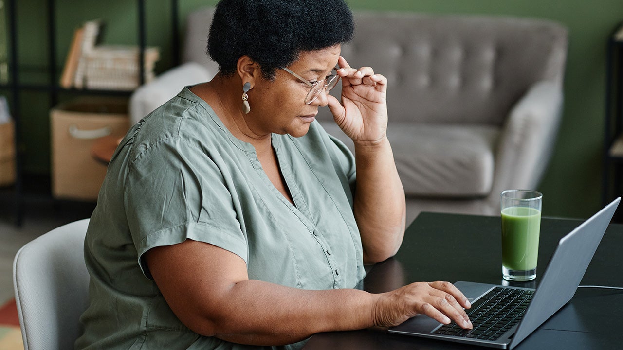 Woman Using Laptop