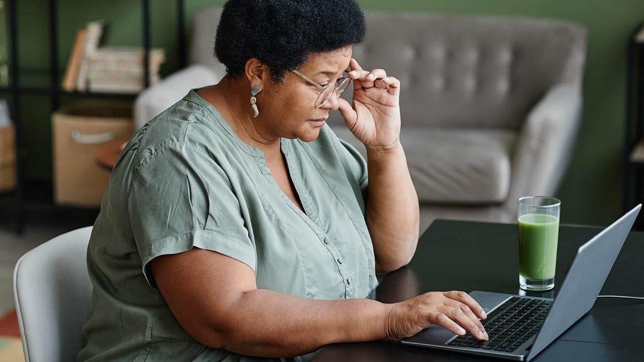 Woman Using Laptop