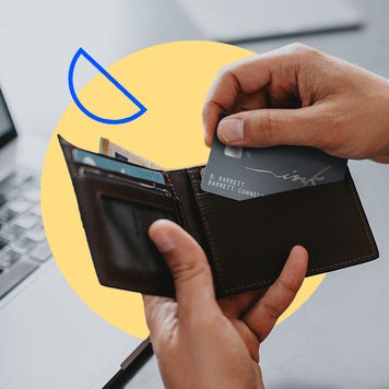 design element including a set of hands pulling out a card from a wallet