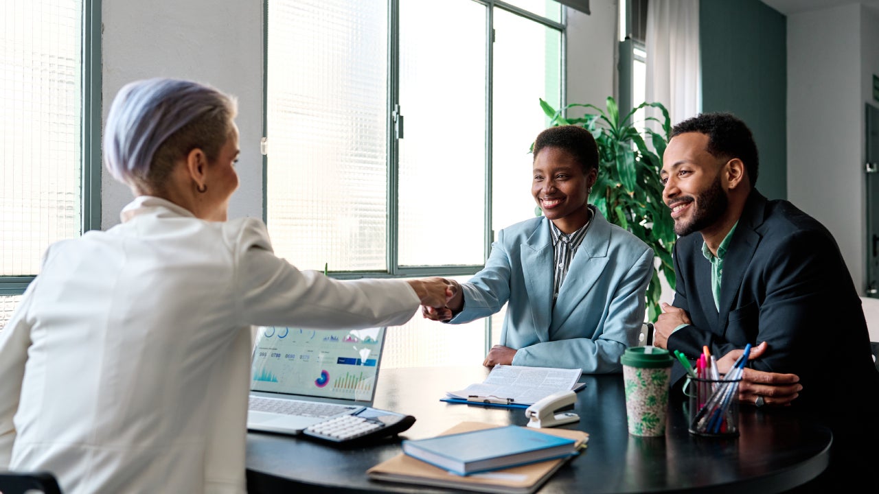 Financial advisor working with clients