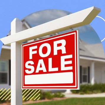 A large "for sale" sign