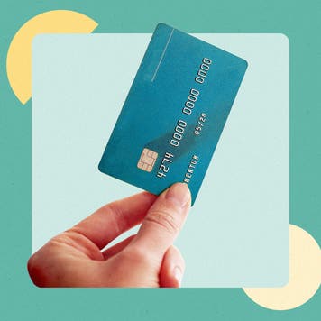 design element of a hand holding a credit card