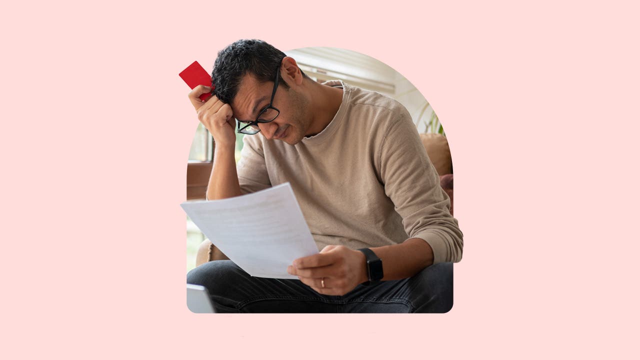 Person reading credit card statement