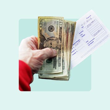 Cash in gloved hand