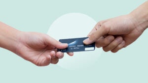 Two people sharing a credit card