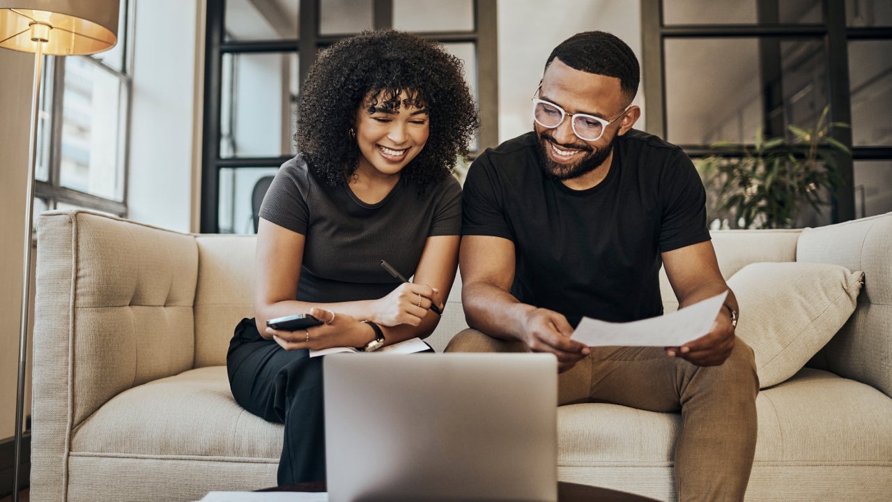 Planning, finance and couple with paper and laptop for budget