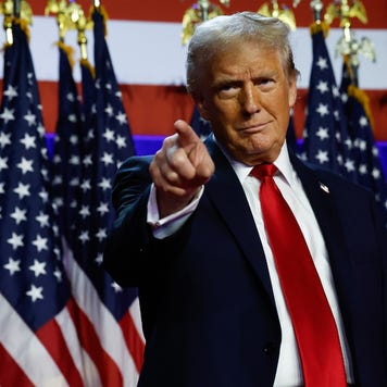 President-elect Donald Trump points out to an audience