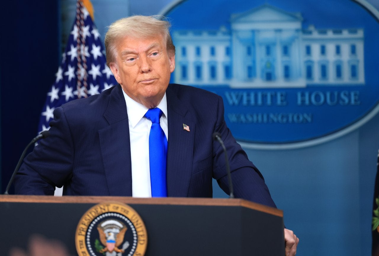 President Donald Trump answers questions during a press conference