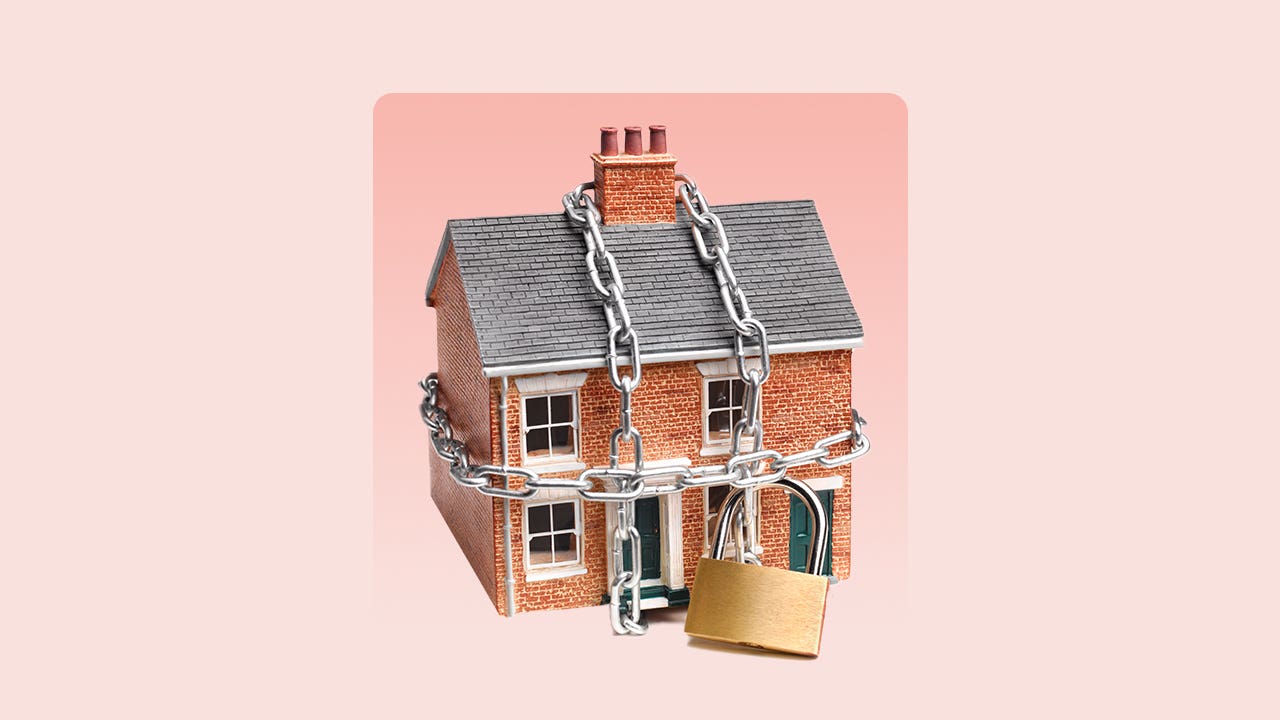 design element of a home with chains and a lock around it