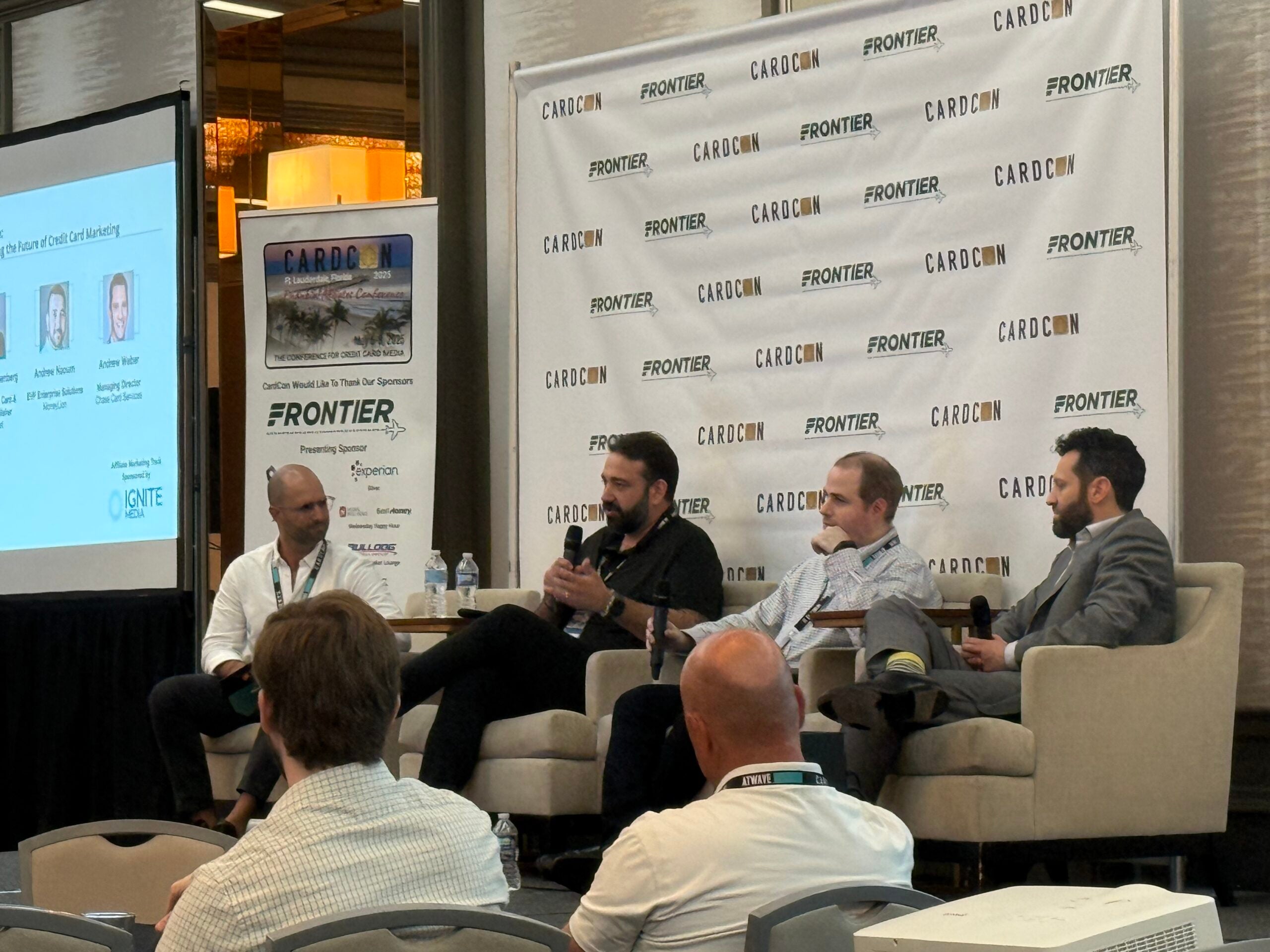 A financial panel presents at the CardCon 2025 conference