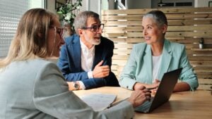 Couple meeting with a financial advisor.