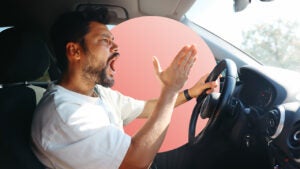 Angry driver in car