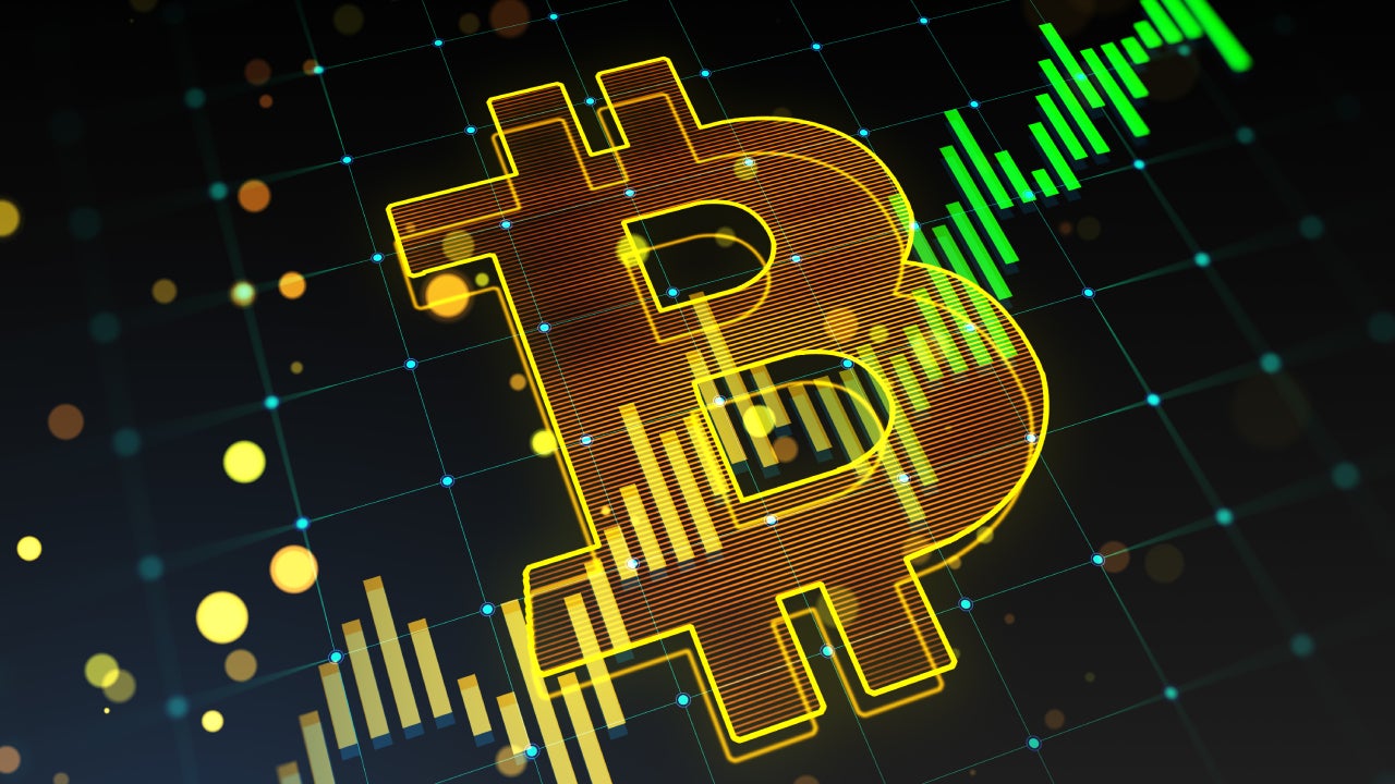 Creative growing green candlestick forex chart and bitcoin on blurry background.