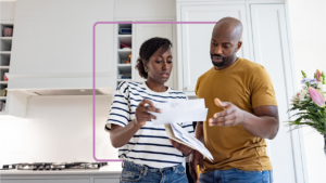 couple looking at loan notice