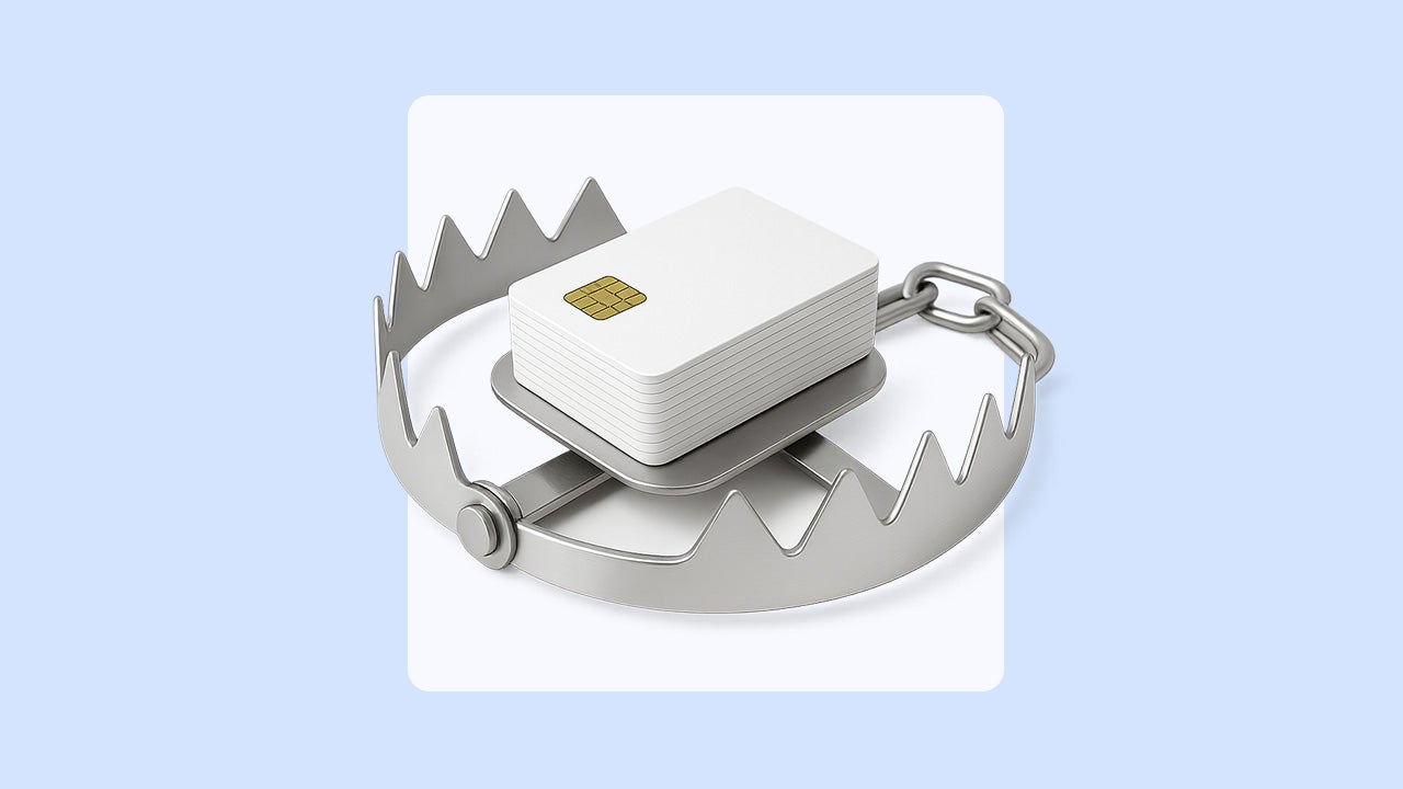 A graphic depiction of credit cards centered in a metal trap