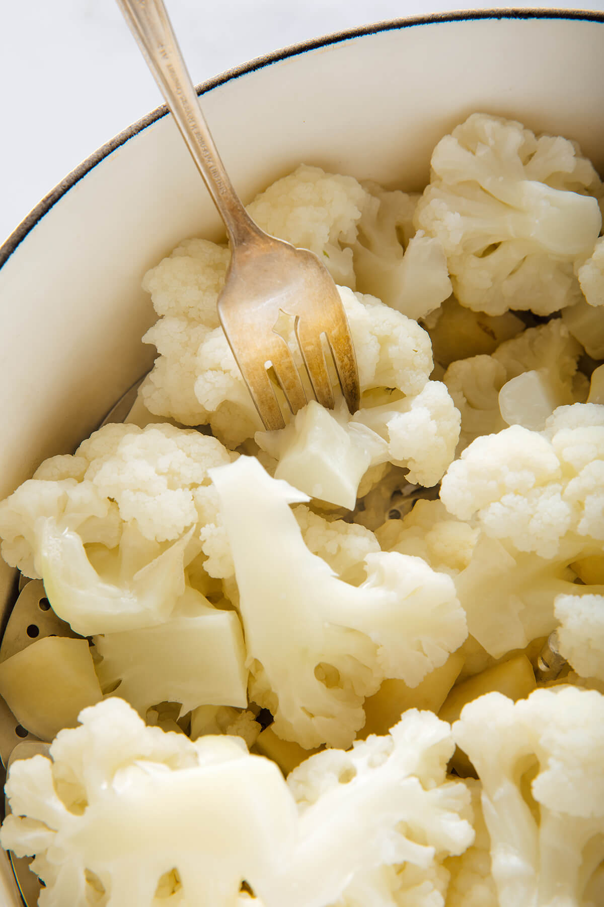 fork-tender cooked cauliflower