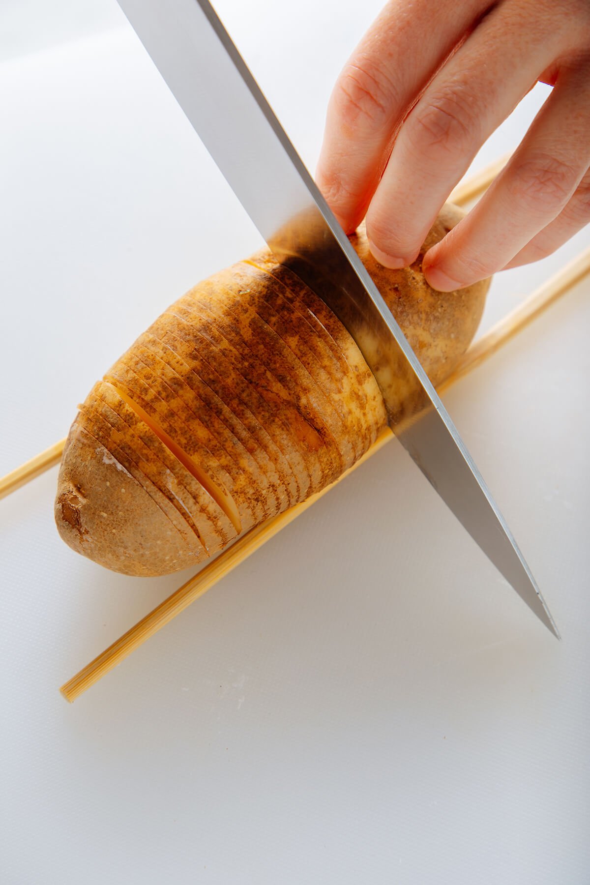 how to slice Hasselback potatoes