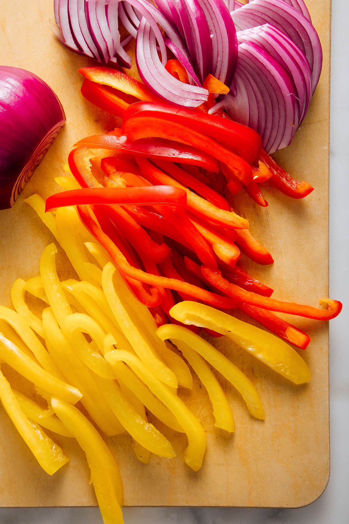 thinly sliced bell pepper and onion